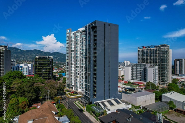 Fototapeta Beautiful aerial view of the Sabana Park in San Jose Costa Rica, and its Skyscrapers, next to the National Stadium