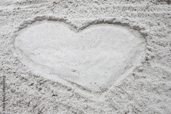 Fototapeta heart shaped sandy beach outline calm soothing sand beach background with copy space