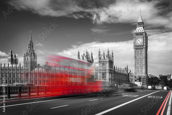 Obraz Red double decker bus with motion blur on Westminster bridge, Big Ben in the background, in London, UK. Black and white with selective color