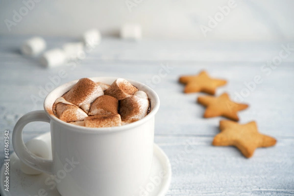 Fototapeta Gingerbread cookies and sweet caramel for a friend or for a child for the evening before Christmas.