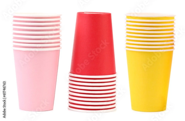 Fototapeta Three different color cups in a row.