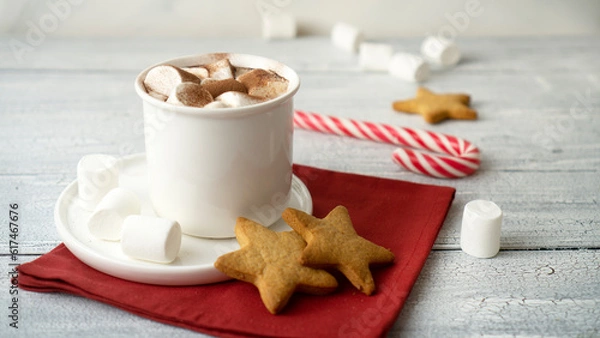Fototapeta Cocoa marshmallows in traditional New Year's chocolate with caramel.