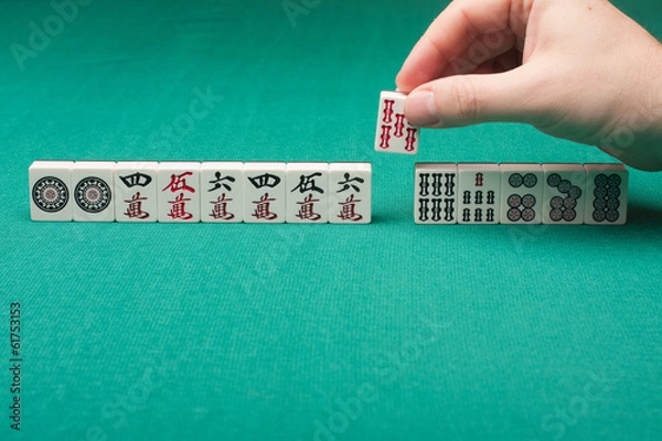 Obraz Smooth table surface with a mahjong on it
