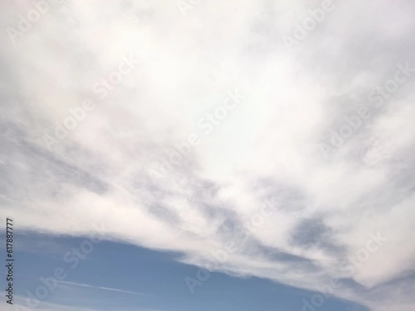 Obraz Illuminated cirrocumulus at noon