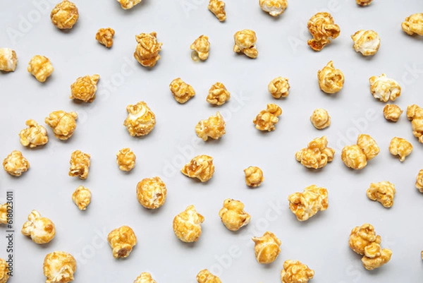 Fototapeta Tasty popcorn on grey background