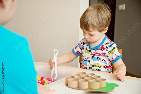 Obraz Happy turtle. Sorting game for toddlers. Fill cells with pompoms. Early education, learning colors and counting. Montessori thematic implement for preschool and special needs school