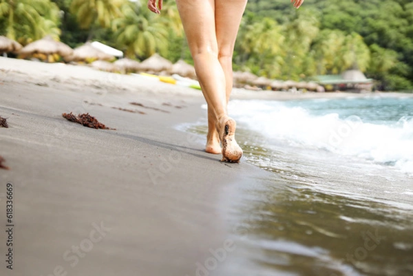 Obraz A person walking on the beach