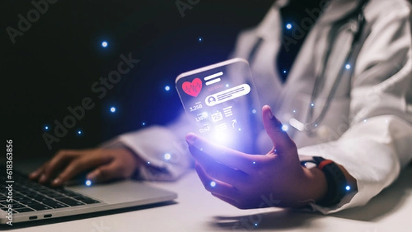 Fototapeta Female doctor using smartphone with medical app on screen. Healthcare concept.