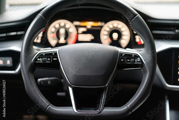 Fototapeta Control buttons on the steering wheel of the car