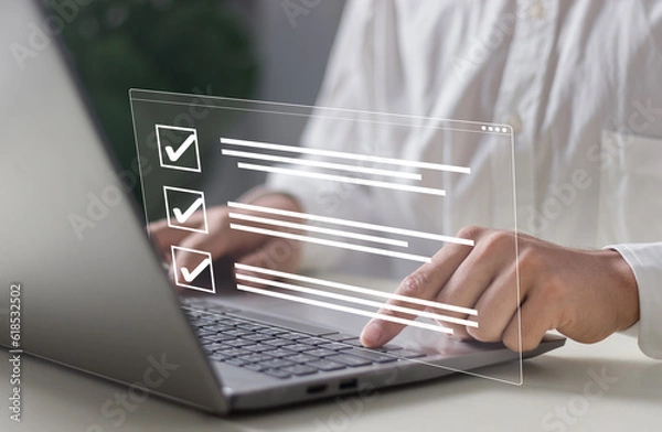 Fototapeta Businessman smart checklist and signs electronic on digital documents concept, Businessman use a pen signs on virtual screen documents with laptop on table