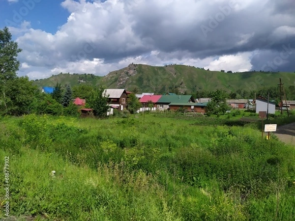 Fototapeta village in the mountains