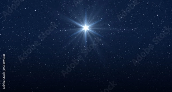 Obraz Star of Jesus with rays of light. Christmas star of the Nativity of Bethlehem, Nativity of Jesus Christ. Background of the beautiful starry sky and bright star.