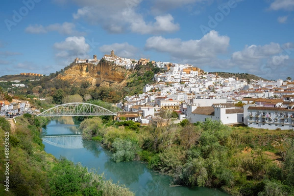 Fototapeta Arcos de la Frontera view with Guadalete River and San Miguel Bridge - Arcos de la Frontera, Cadiz, Spain