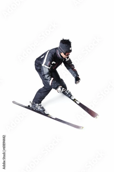 Fototapeta One male skier skiing without sticks on a white background