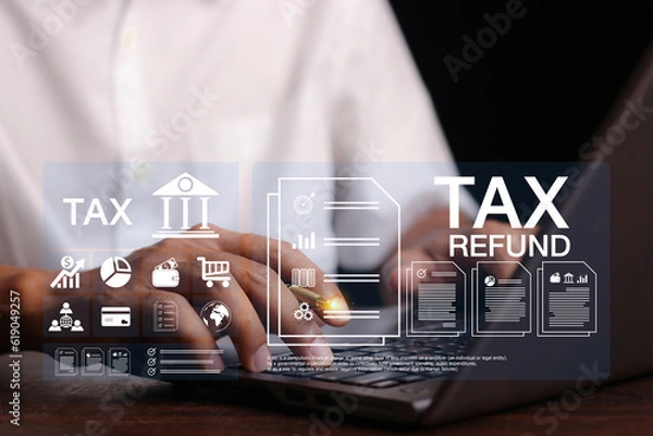 Fototapeta Concept of tax payment optimisation business finance,Man using calculator and taxes icon on technology screen,income tax and property, individuals and corporations such as VAT