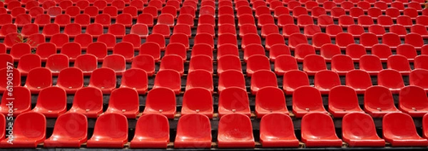 Obraz Rzędy czerwonych siedzeń stadionów piłkarskich z numerami