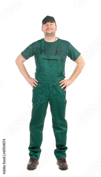 Fototapeta Worker in green overalls.