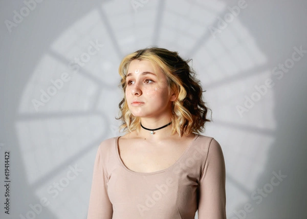 Obraz Modern beautiful girl in a photo studio