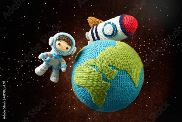 Fototapeta あみぐるみ人形　子供の宇宙飛行士イメージ