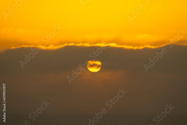 Fototapeta Atardecer con nubes
