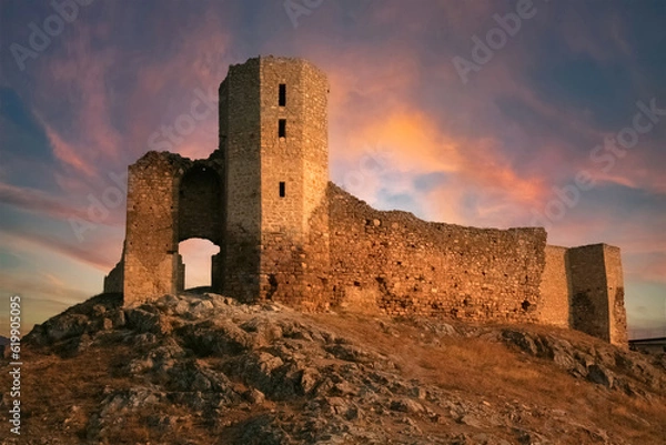 Fototapeta Escape tower in the wilderness at sunset. Biblical concept.