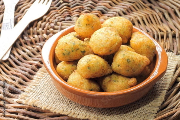 Obraz Cod fritters. Buñuelos de bacalao. Acras de morue