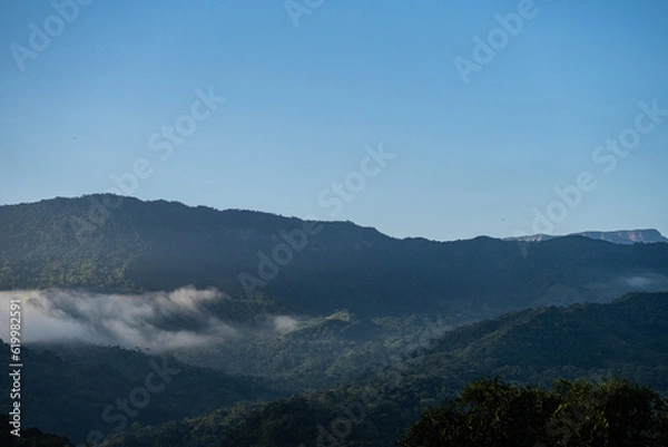 Fototapeta Mystical Mist: Enchanting Mountains veiled in Fog