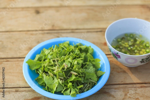 Fototapeta Coriander leaf in the dish
