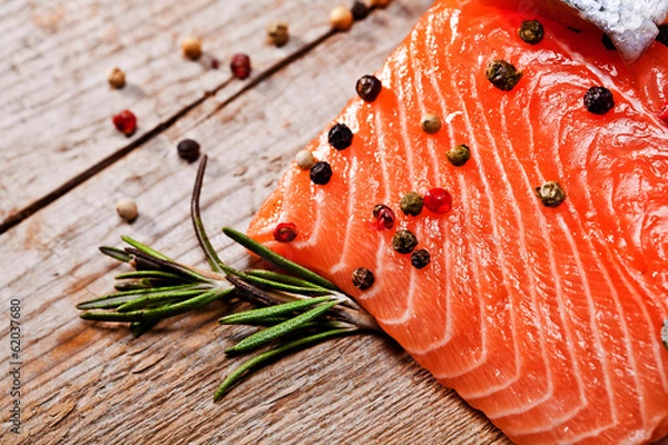 Fototapeta Salmon with lemon and pepper 