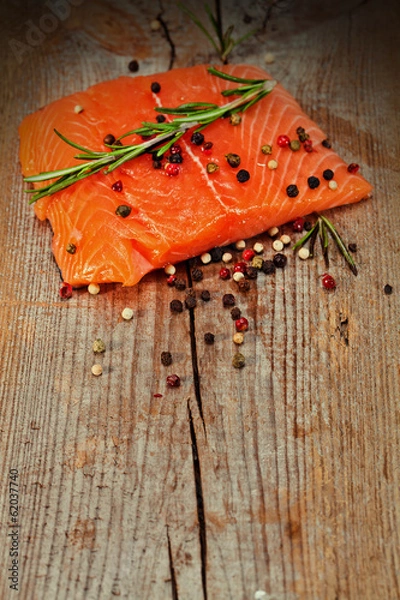 Fototapeta Salmon with lemon and pepper 