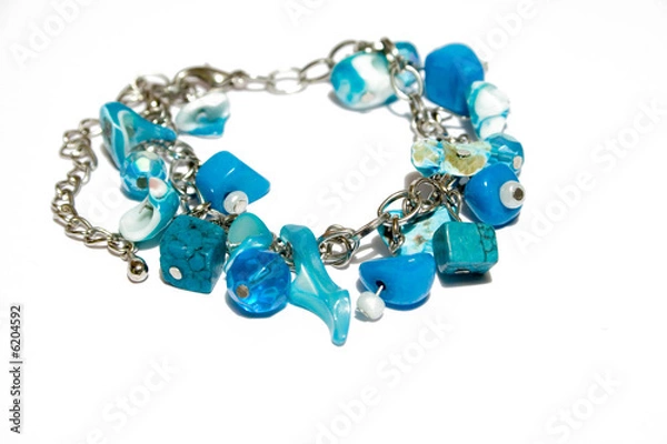 Obraz blue bracelet on the white isolated background