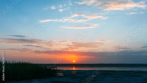 Fototapeta Beautiful sunset over the estuary