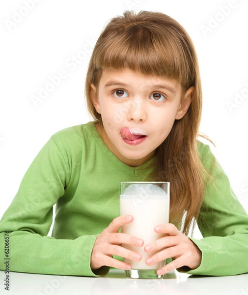 Obraz Cute little girl showing milk moustache