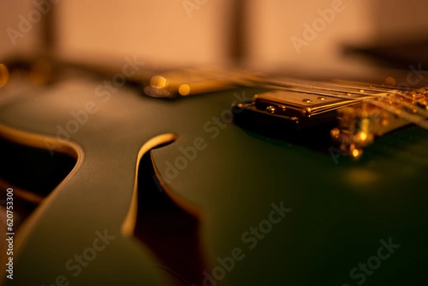 Obraz Beautiful green jazz guitar closeup