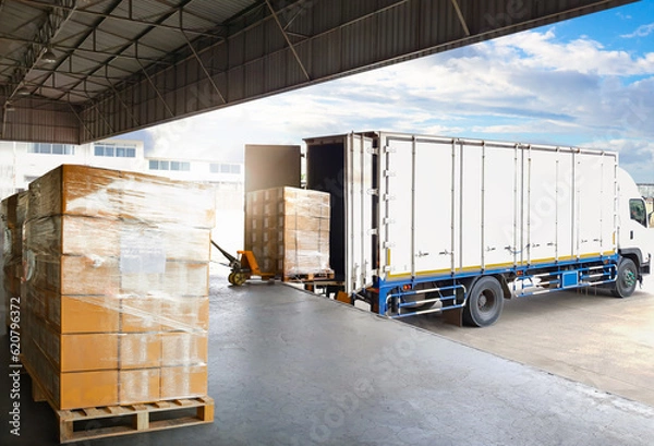 Fototapeta Container Trucks Parked Loading Package Boxes Pallets at Warehouse Dock. Supply Chain, Distribution Warehouse Shipping, Supplies Shipment Boxes. Freight Truck Logistic, Cargo Transport.
