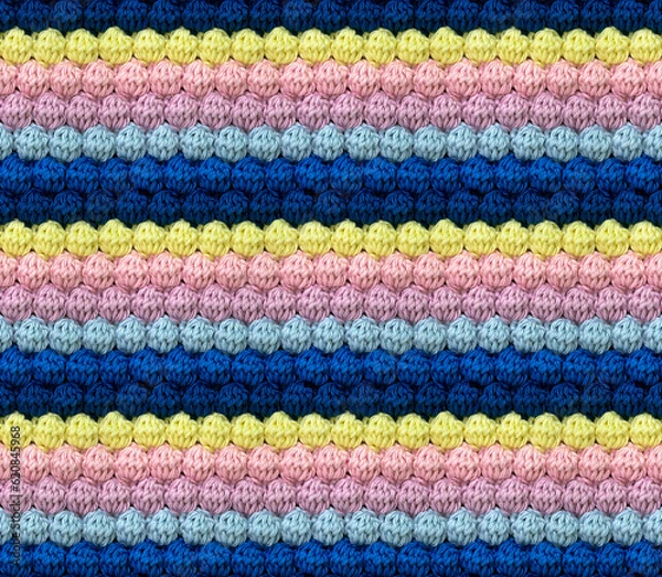 Fototapeta Geometric volumetric seamless knitted pattern in the form of bumps. The texture is crocheted from multi-colored yarn. Pastel contrasting color combination.