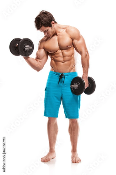 Fototapeta Muscular bodybuilder guy doing exercises with dumbbells over whi