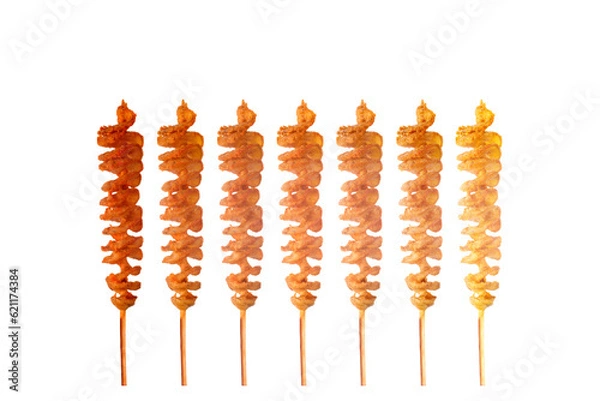 Obraz FriedTwist potato on bamboo skewers isolated on white background.