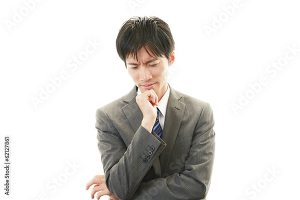 Fototapeta 苦悩するビジネスマン
