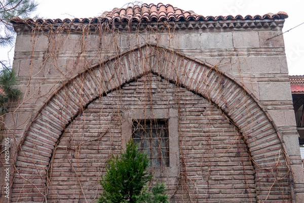 Fototapeta historical stone building with brick arches