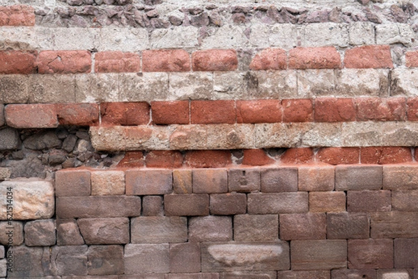 Fototapeta close-up photograph of a historic building.brick,blockstone,concrete