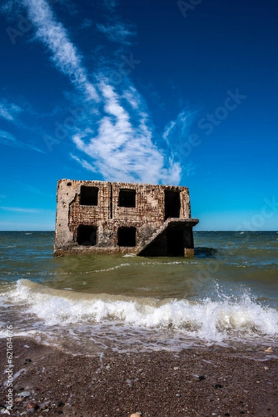 Fototapeta Old war fortification in Karosta (Liepaja, Latvia) surrounded by the Baltic sea during sunny summer day