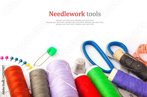 Obraz Sewing tools, thread, scissors, pins and measure type on white