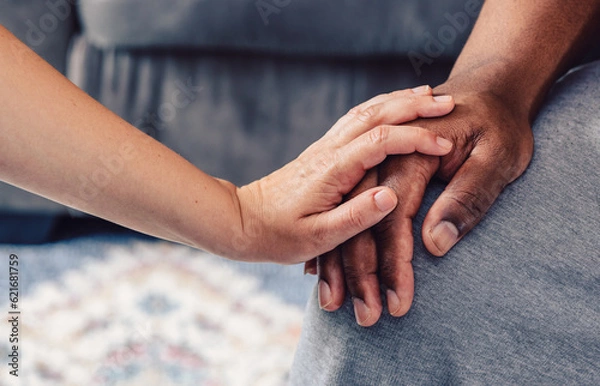 Fototapeta two hands man and woman showing act of support togetherness or kindness