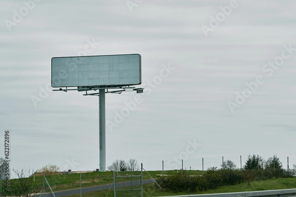 Fototapeta Motorway Billboard Mockup. A Blank Canvas for Advertising on the Open Road