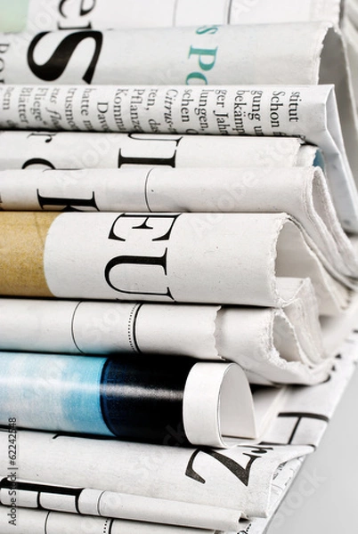 Obraz Stack of folded newspapers