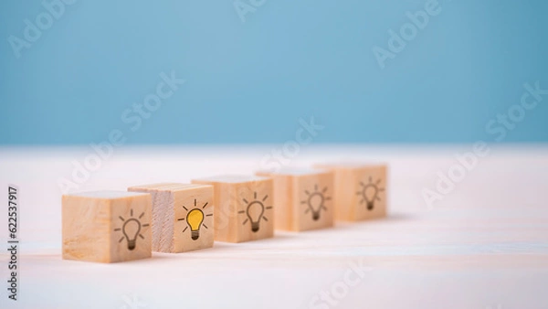 Fototapeta Creative Design Solutions with Wooden Blocks: Inspiring Ideas, Strategies, and Collaborative Thinking for Success in Business and Marketing.