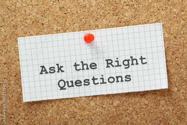 Fototapeta Ask The Right Questions on a cork notice board