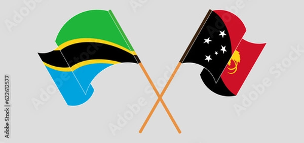Fototapeta Crossed and waving flags of Tanzania and Papua New Guinea