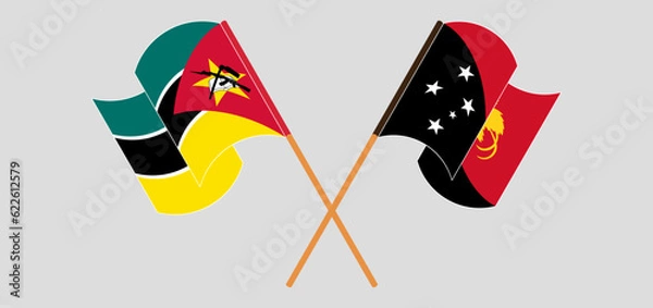Fototapeta Crossed and waving flags of Mozambique and Papua New Guinea